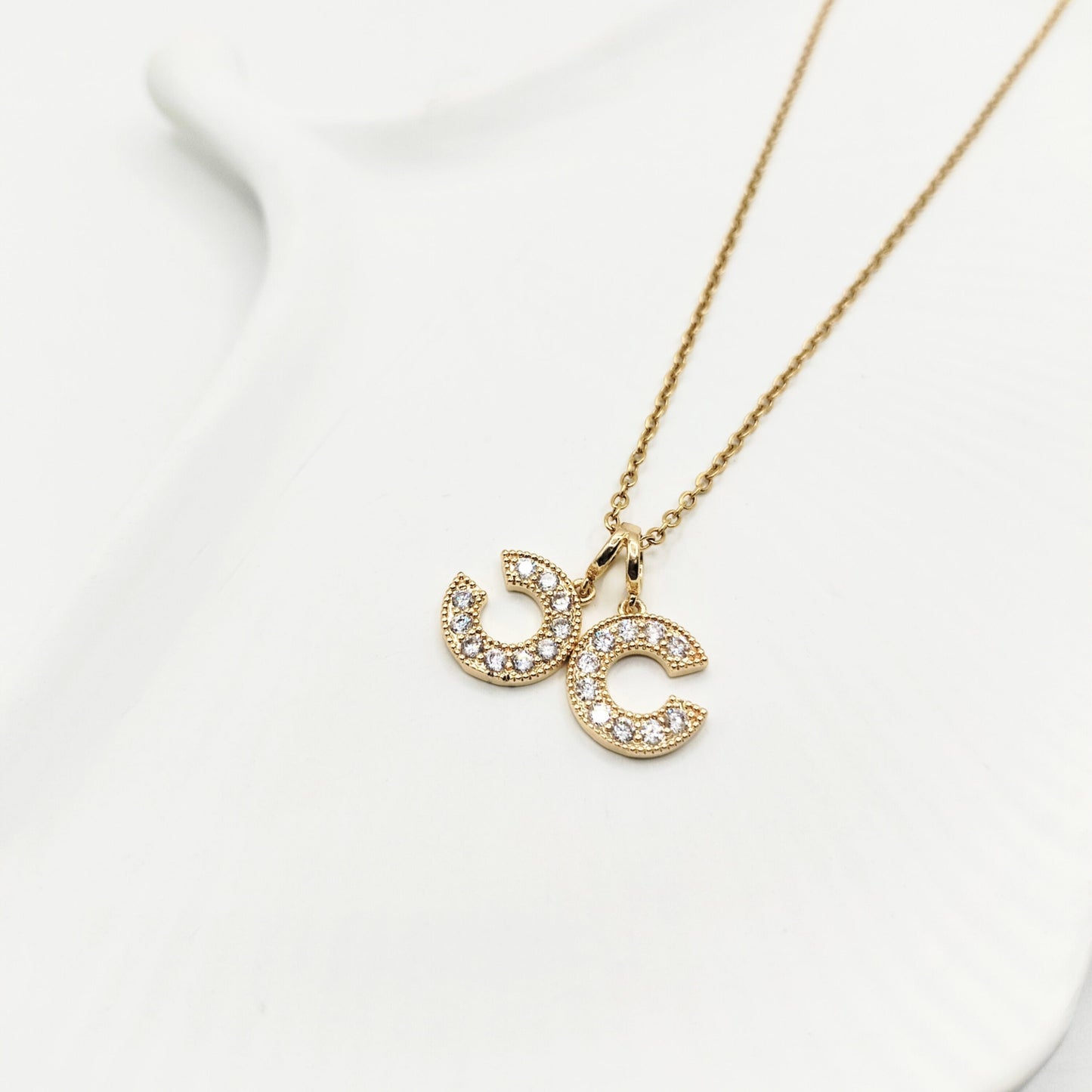 CHANNEL CHARM NECKLACE