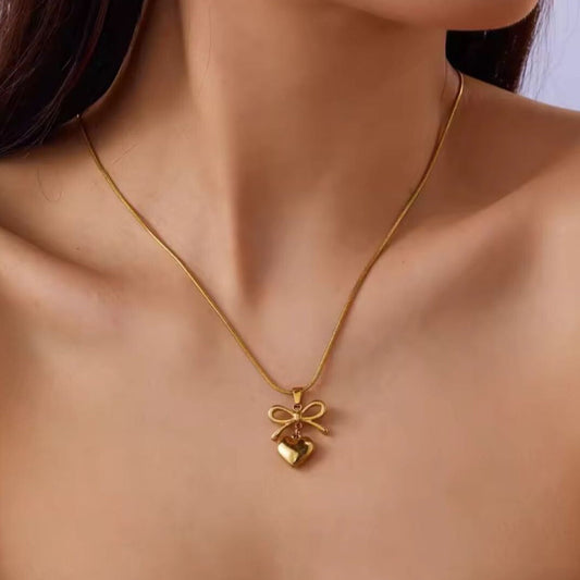 BOW HEART NECKLACE