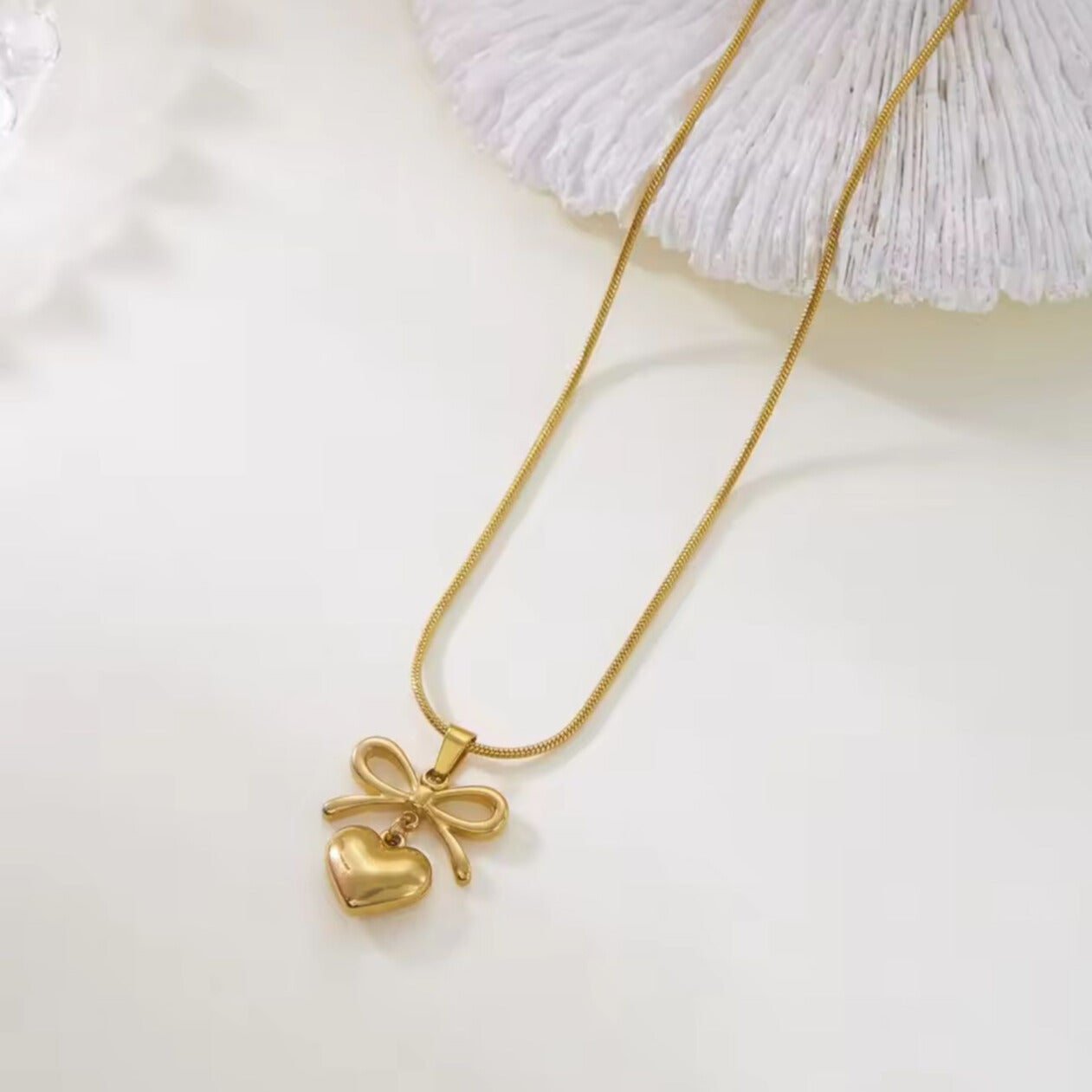 BOW HEART NECKLACE