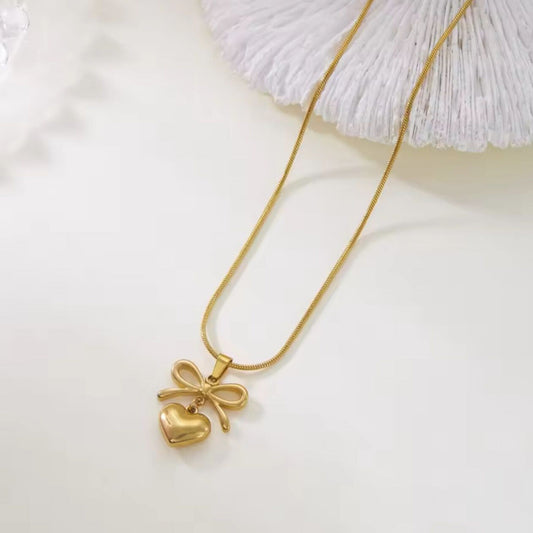 BOW HEART NECKLACE