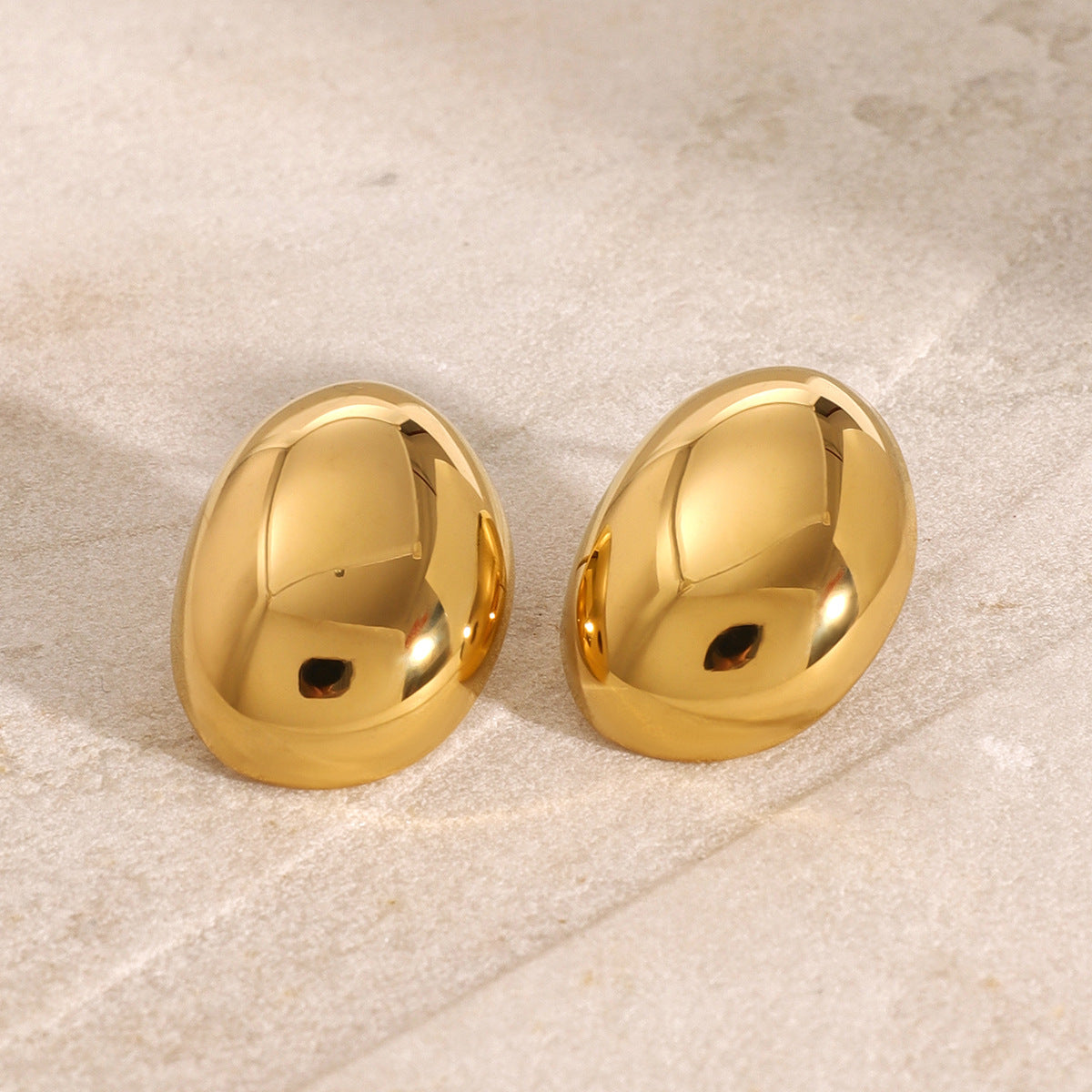 OVAL SHAPED EARRINGS