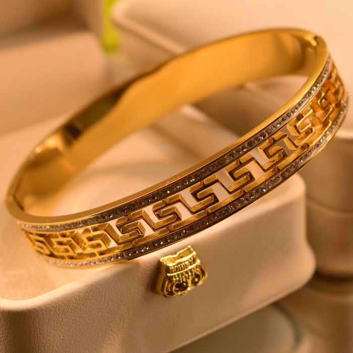 SET OF 2 BANGLES LV & VERSACE*